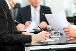 FUCHS employees during a business meeting