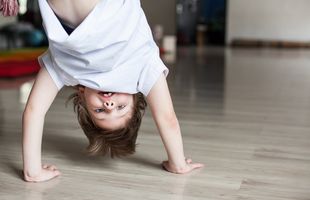 Child doing a handstand